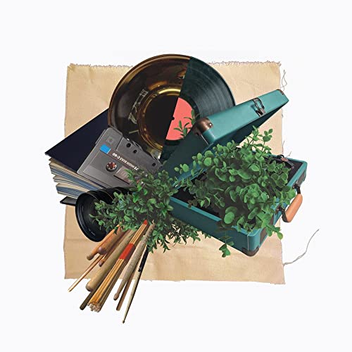 Album cover with vinyl record, cassette, greenery, and vintage turntable.