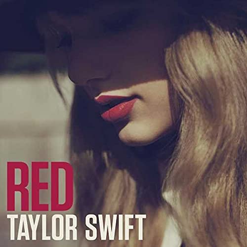 Taylor Swift's "Red" album cover, close-up of face with red lips.