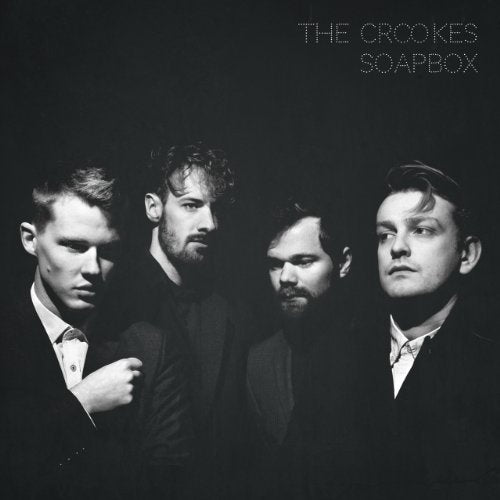 Black and white portrait of four men, album cover for "Soapbox".