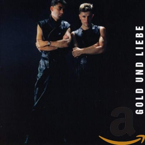 CD cover featuring two men in dark clothing with bold text.