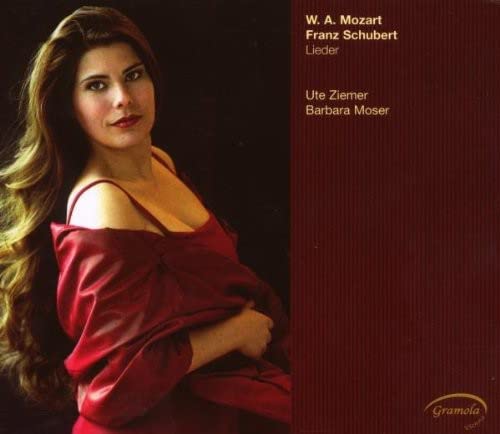 CD cover featuring portrait of a woman in a red dress.
