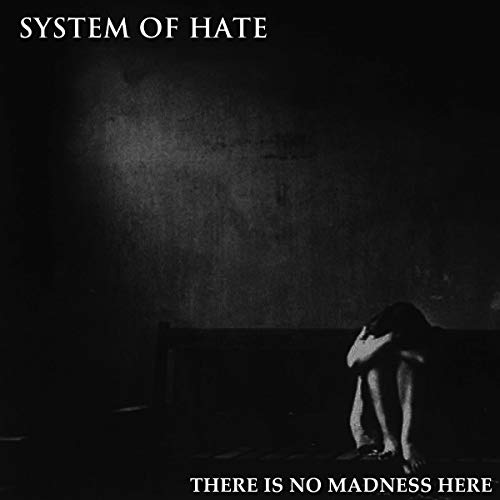 Black and white album cover featuring a person seated with head in hands.