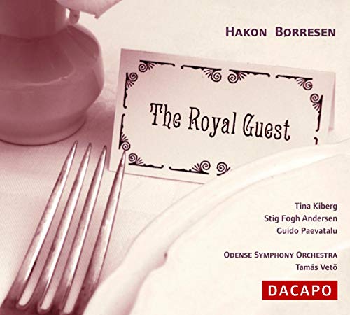 CD cover: ornate card with text, fork, and blurred background.