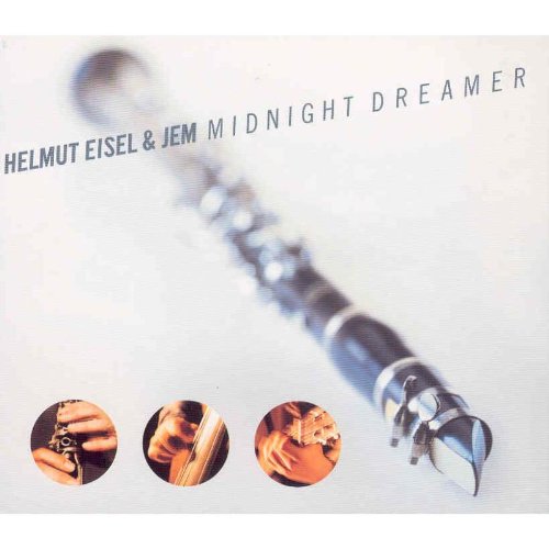 "Album cover with a silver flute and three circular images of reeds."