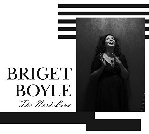 Black and white album cover with a woman in a dark dress singing.