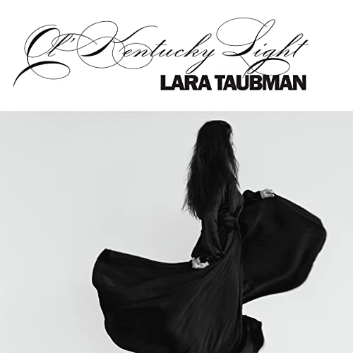 CD cover: Lara Taubman in black dress, flowing fabric, grayscale.