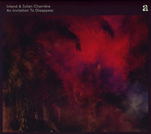 Album cover with smoky palm trees and red haze, dark purple border.