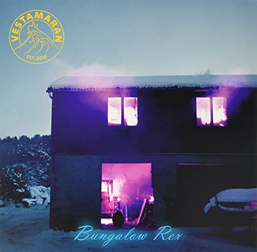 Album cover: a dark building with lit windows, snowy landscape, and logo.