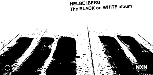 CD cover: black and white abstract piano keys, album title text.