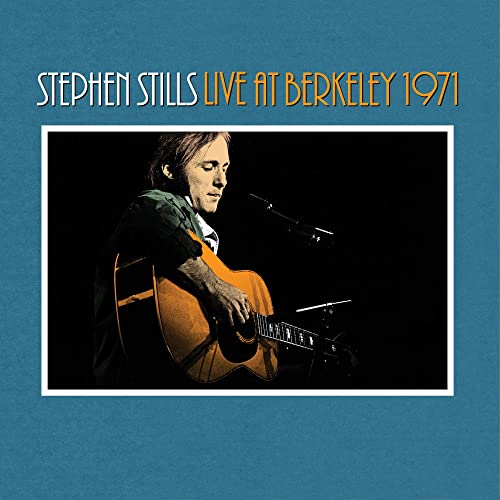 Stephen Stills playing acoustic guitar, album cover for live concert recording.