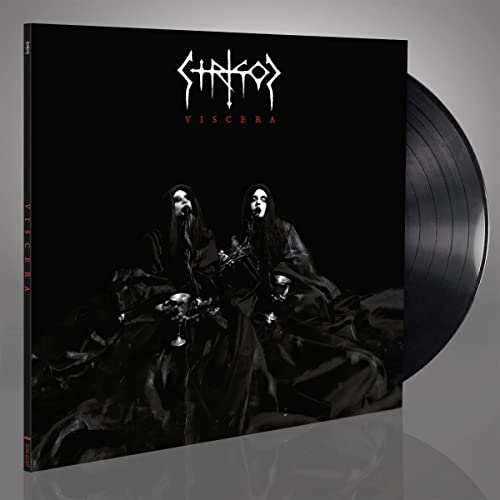 Black vinyl record with album cover featuring dark figures and text.
