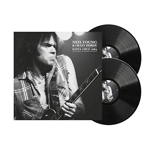 Neil Young album cover and two black vinyl records displayed together.
