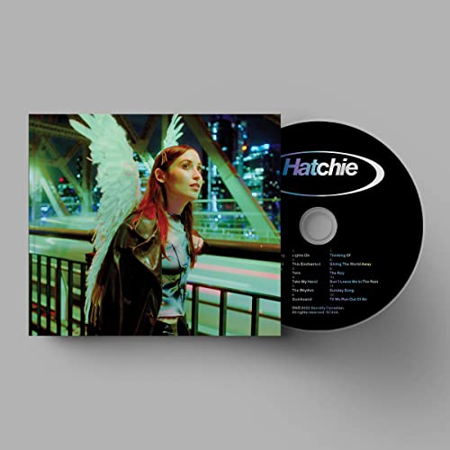 Hatchie album cover with a woman and angel wings, beside a CD.