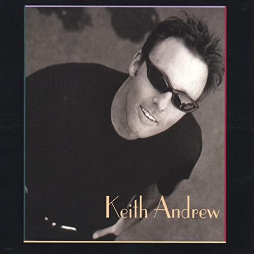 Black and white CD cover featuring a man wearing sunglasses.