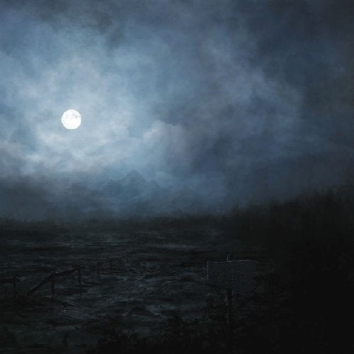 Dark, moody landscape with a full moon and silhouetted mountains.