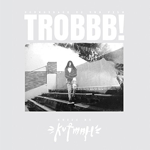 CD cover for Kutmah’s “Trobbb” featuring a lone figure on stairs.