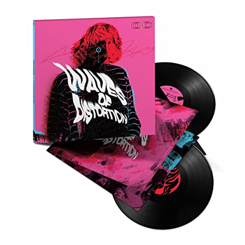 Pink album cover with figure, two black vinyl records, and inner sleeves.