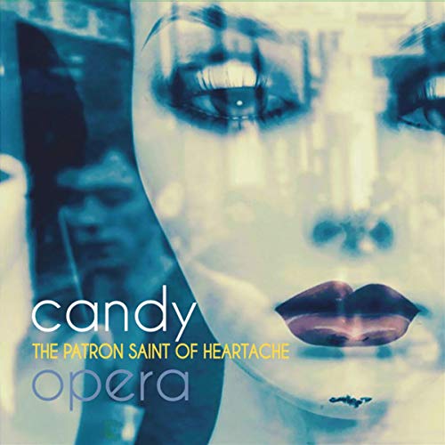 Vinyl record cover with a close-up of a face and text “candy opera”.
