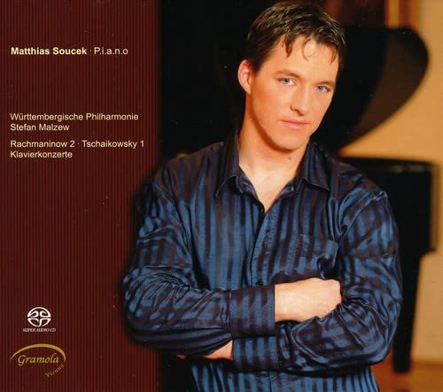 CD cover featuring a man in a blue striped shirt with arms crossed.