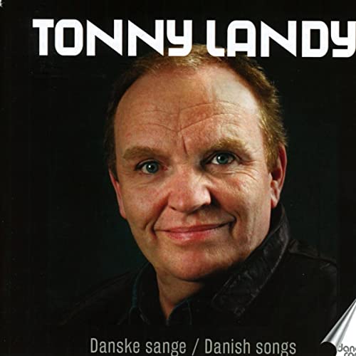 Close-up portrait of Tonny Landy, a smiling man with short brown hair.