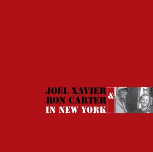 CD case featuring album art likely depicting Xavier, Joel, Carter, and Ron in New York.