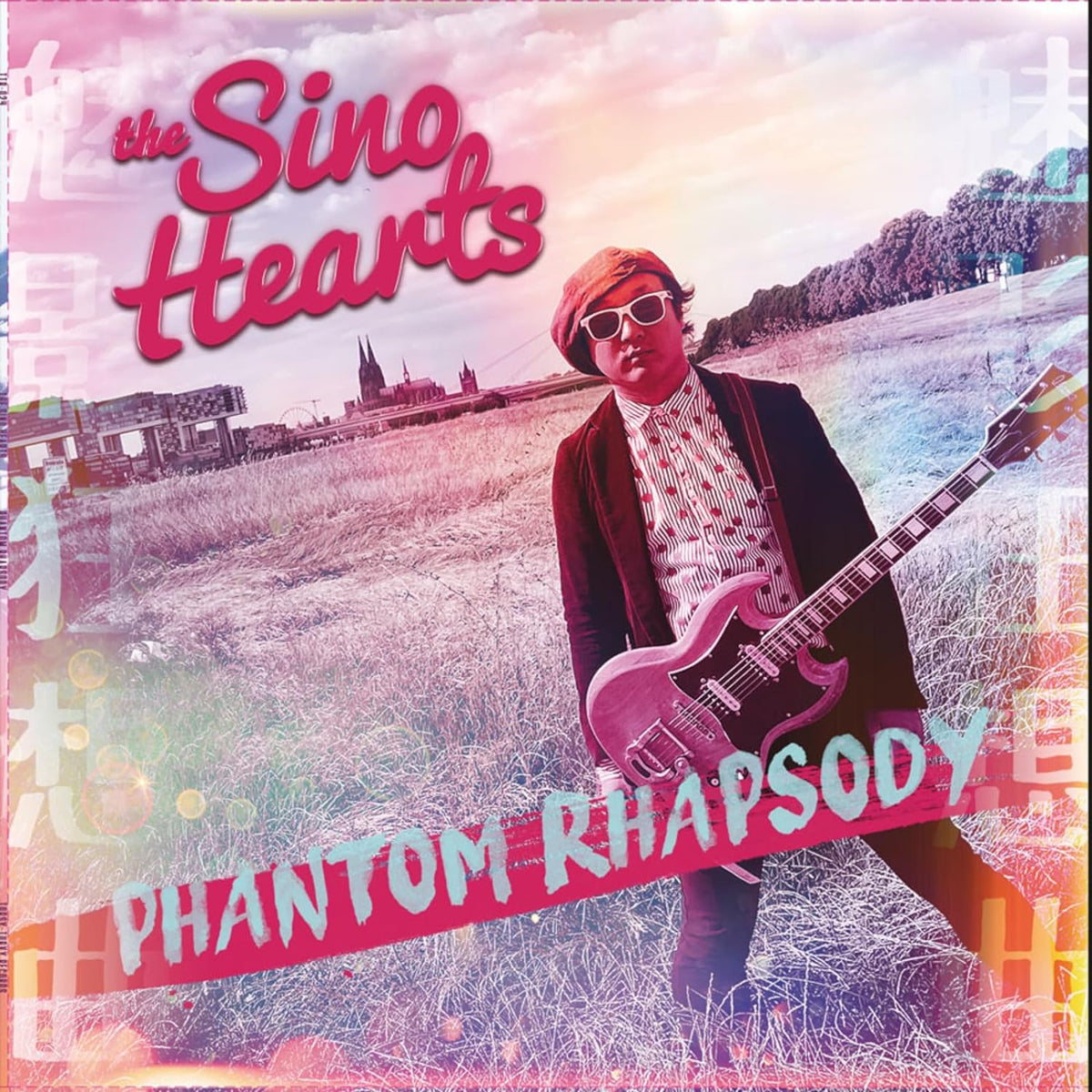 Album cover: man with guitar in a field, titled "Phantom Rhapsody".