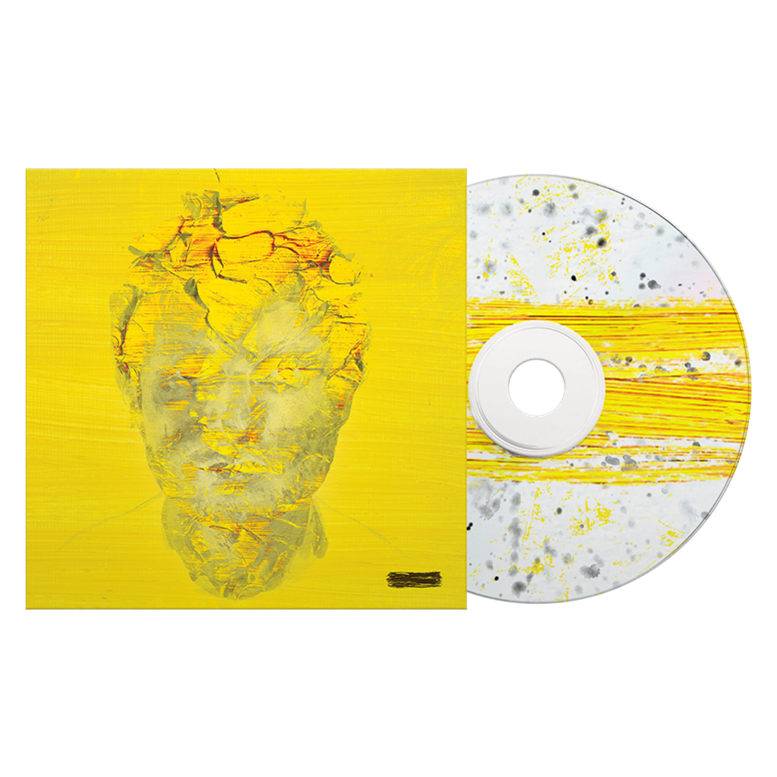 A CD case with a yellow cover and a white CD with yellow splatters.