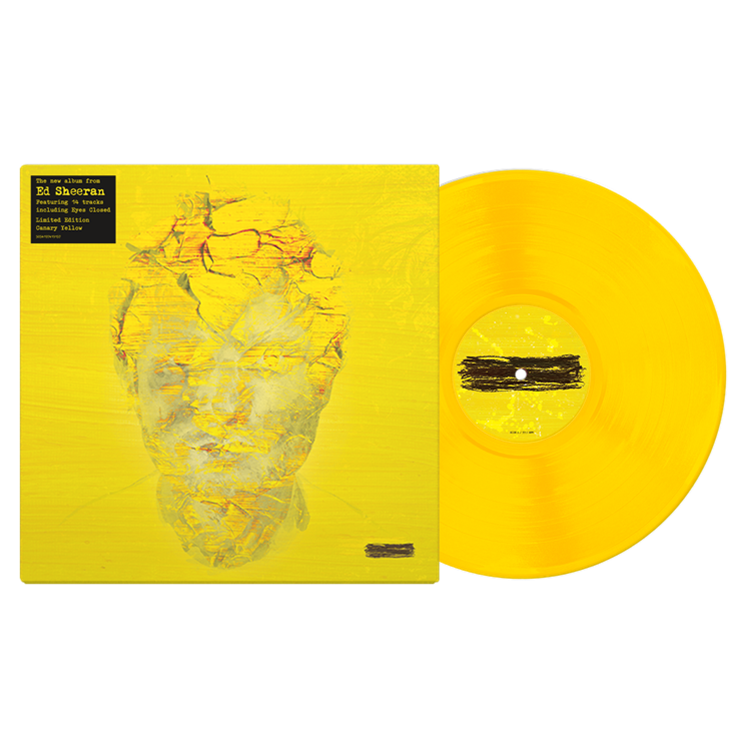 Yellow vinyl record and album cover featuring abstract heart-shaped art.