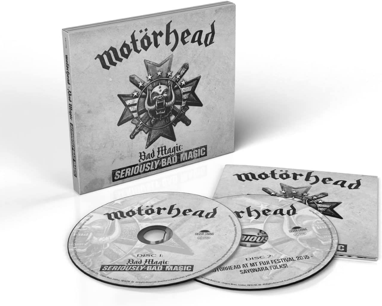 "CD case and two discs with 'Motörhead' and 'Bad Magic' artwork on a white background."