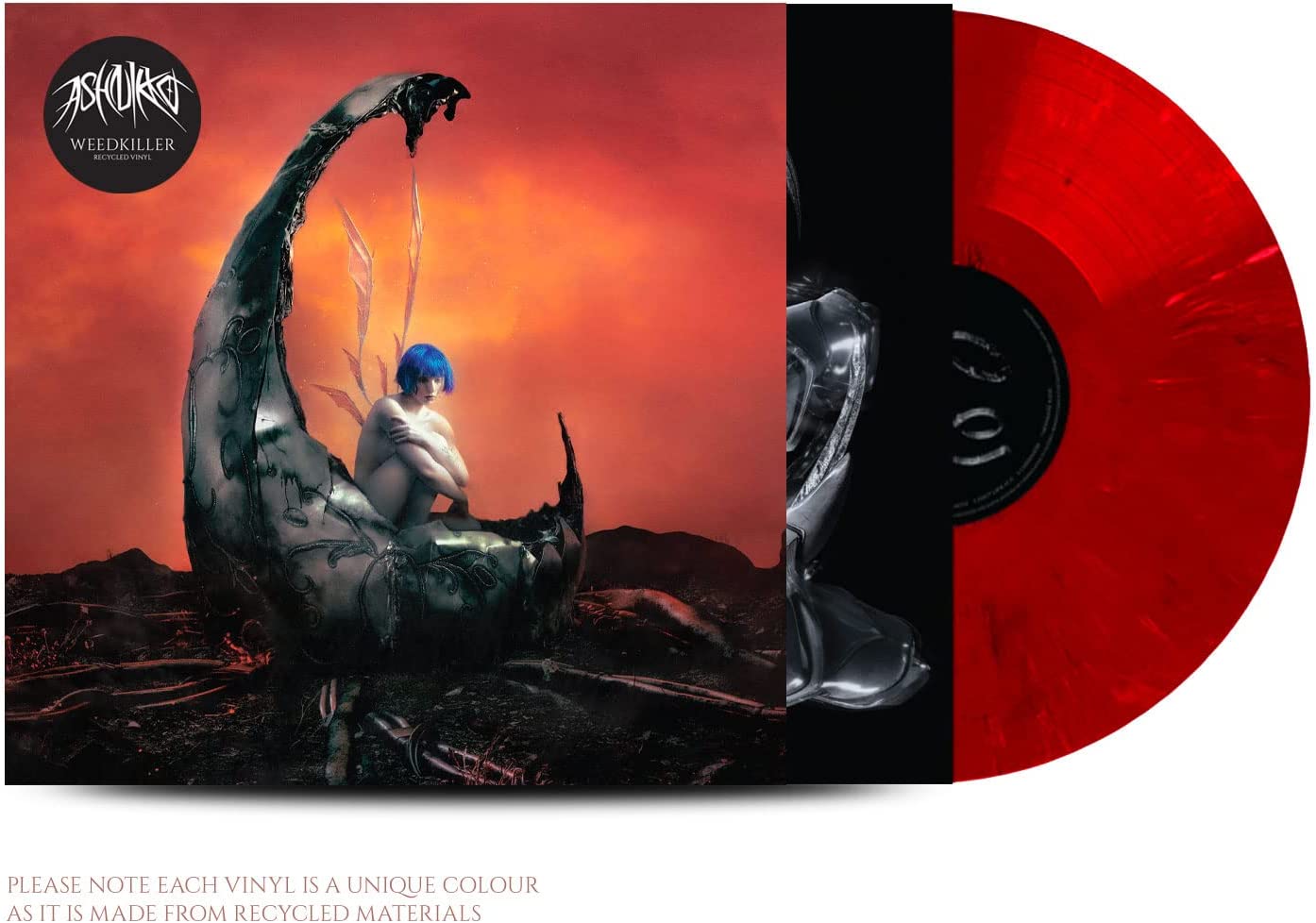 "Vinyl record with red disc and album cover featuring surreal artwork and nude figure."