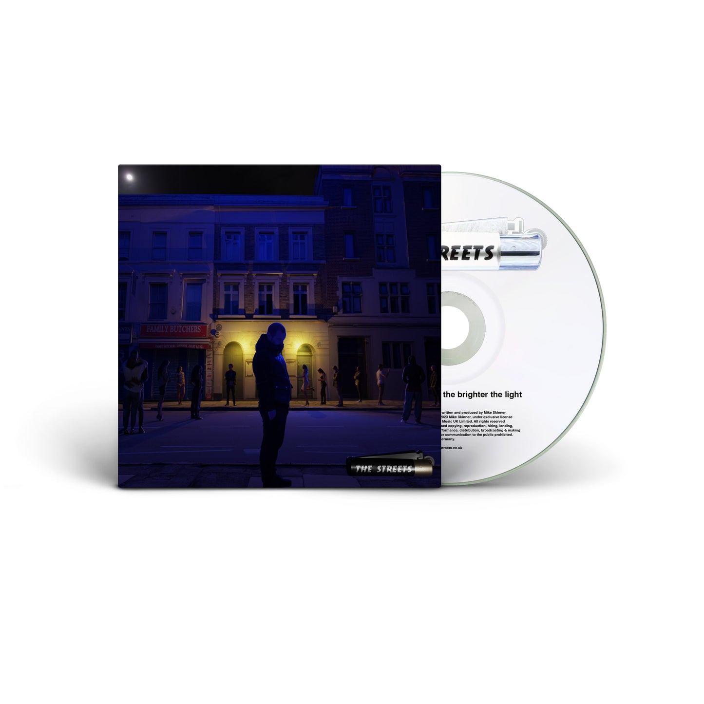 "CD case with a dark street scene cover and partially visible disc."