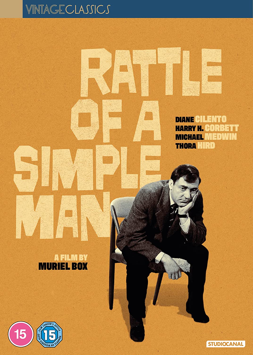 DVD cover for "Rattle of a Simple Man" featuring a man in a suit.