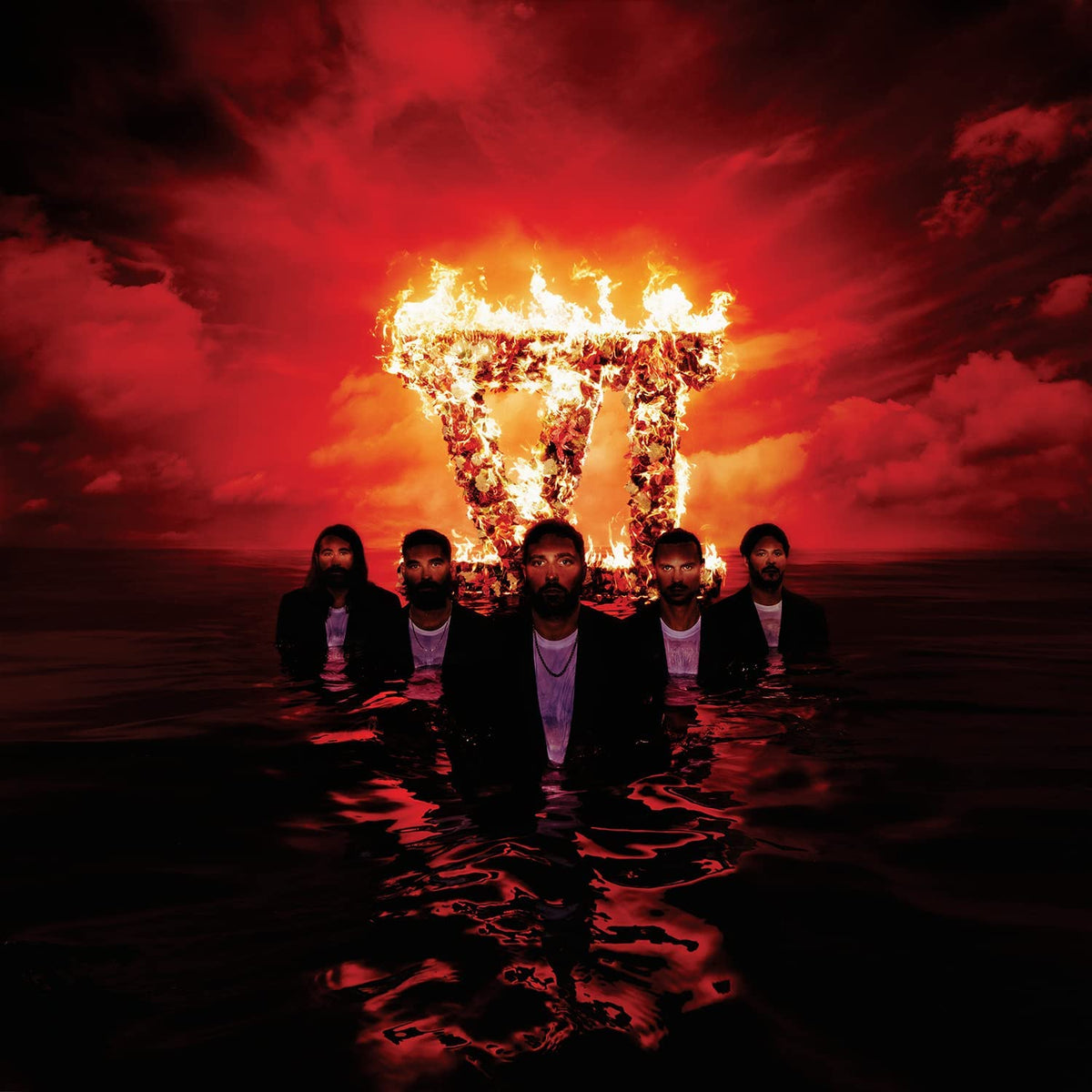 Band submerged in water, with a flaming, distorted letter “T” above.