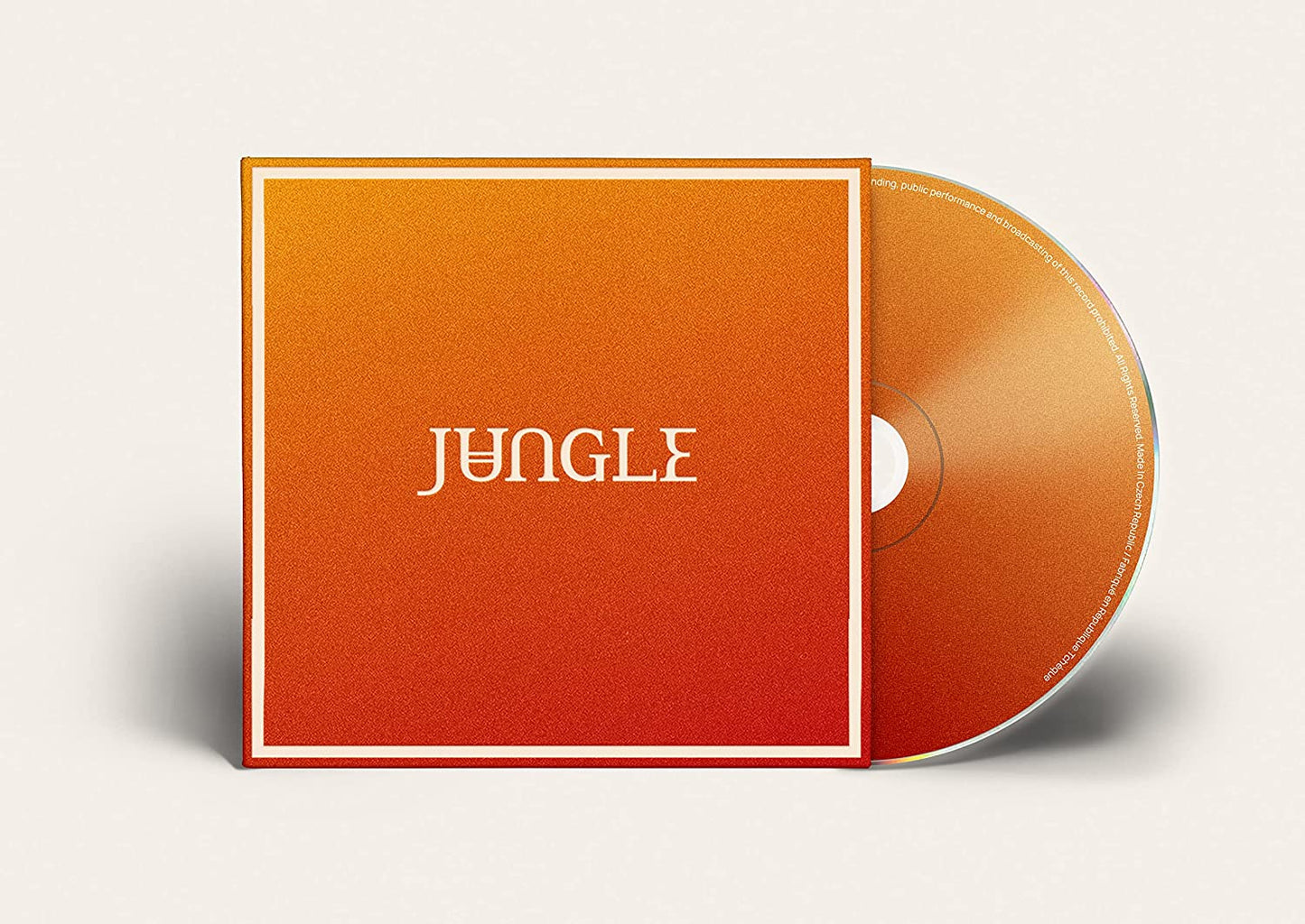 CD case with orange and red geometric design, labeled "Jungle.