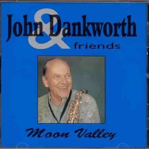 "CD cover with blue background, photo of man holding saxophone, and 'John Dankworth friends' text."