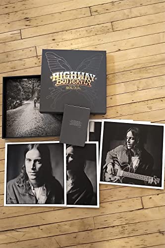 Black vinyl box set with photos of musician Neal Casal and landscapes.
