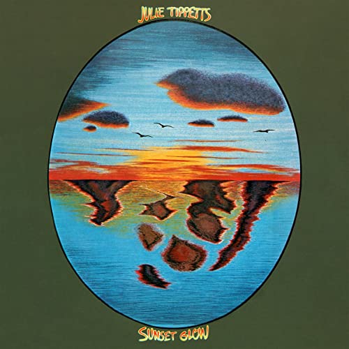 Album cover for Julie Tippetts’ “Sunset Glow” featuring a painted sunset scene.