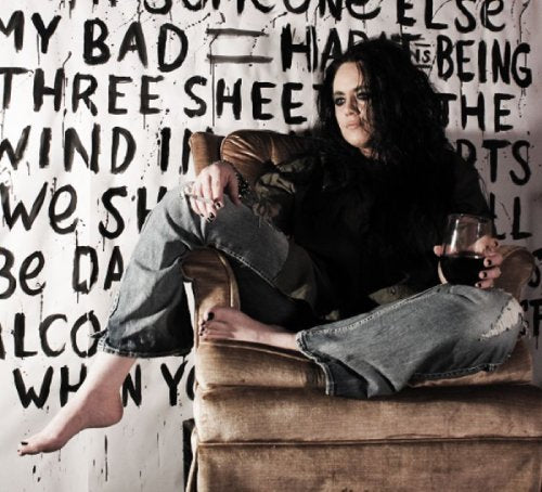 Kara Clark CD cover featuring a woman with long dark hair lounging.