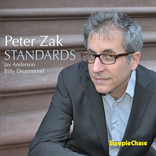 CD cover featuring Peter Zak, a man with glasses, in a suit.