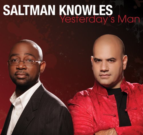 CD cover featuring two men, Saltman Knowles, against a dark red background.