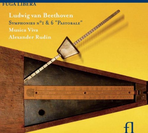 A CD cover featuring a dulcimer on a yellow background with text and a logo.