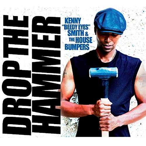 Album cover with man holding a sledgehammer, wearing a blue cap and sleeveless shirt.