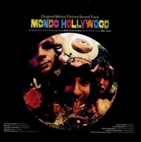 CD cover for "Mondo Hollywood" featuring surreal, collage-style faces and eyes.