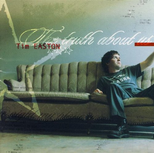 "Album cover with a man lounging on a couch, wearing an 'Alaska' shirt."