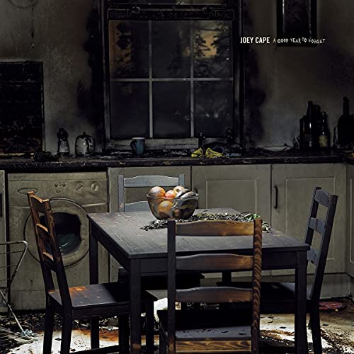Vinyl album cover: kitchen scene with fruit bowl and window.