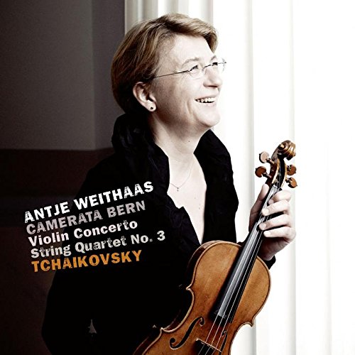 A woman holds a violin, smiling, on a music CD cover.
