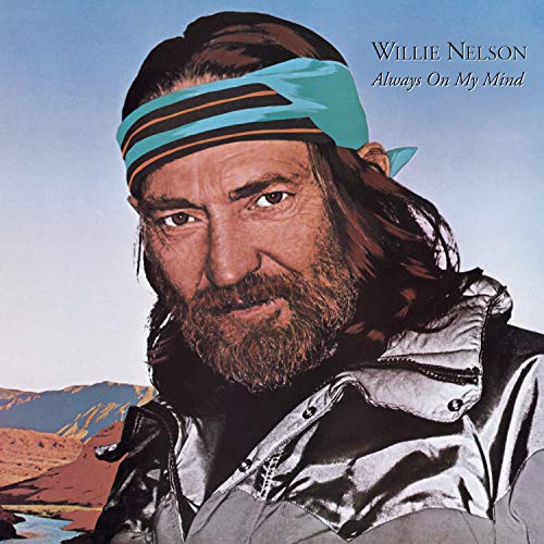 Album cover of Willie Nelson wearing a blue headband and silver jacket.