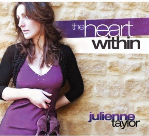 "Album cover featuring a woman in purple against a stone wall with text overlay."