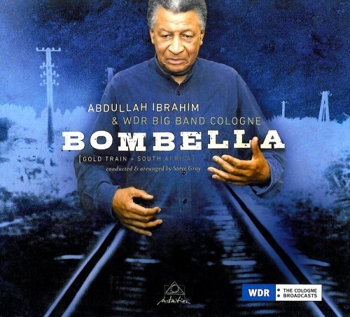 "CD cover featuring a man standing on train tracks with 'Bombella' title."