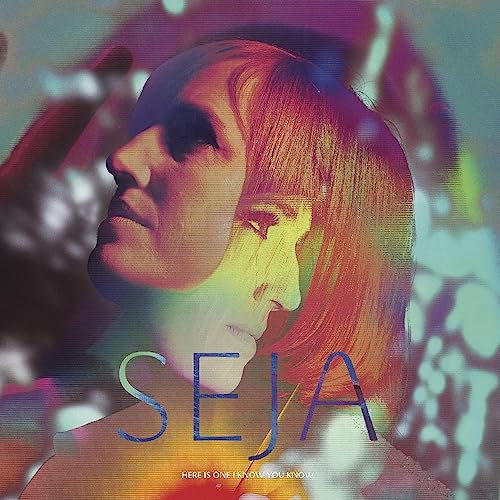 Album cover for Seja, featuring a blurred portrait and blue text.